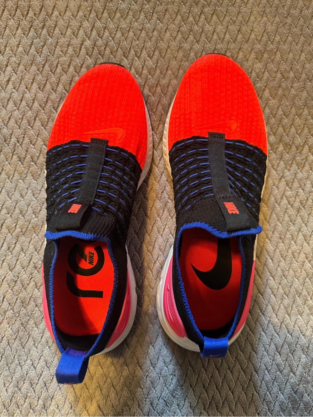 Nike Women’s Phantom Red, Black and Blue Slip-On Athletic Shoes